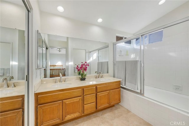 bathroom featuring ceiling fan, tile patterned floors, vanity, and shower / bath combination with glass door