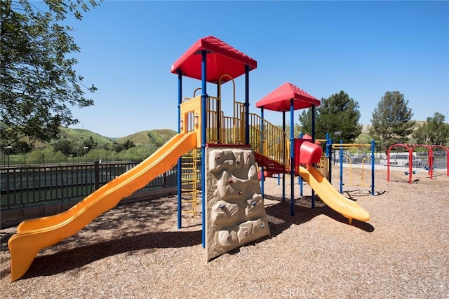 view of play area featuring a mountain view