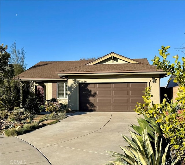 single story home featuring a garage