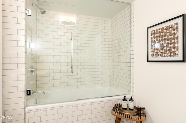 bathroom featuring enclosed tub / shower combo