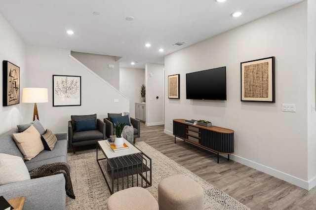 living room with wood-type flooring