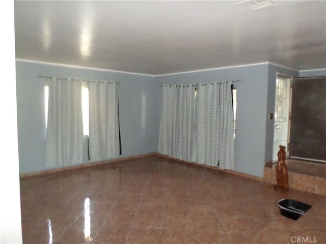 unfurnished room featuring tile patterned floors and billiards