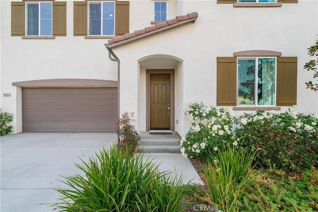 property entrance with a garage