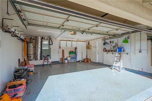 garage with heating unit, water heater, and a garage door opener