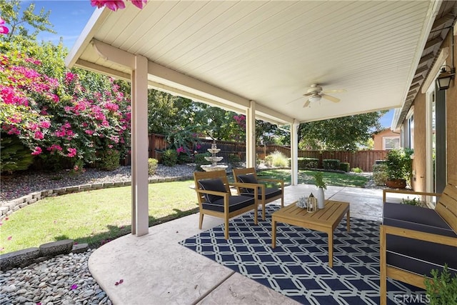 view of patio featuring ceiling fan