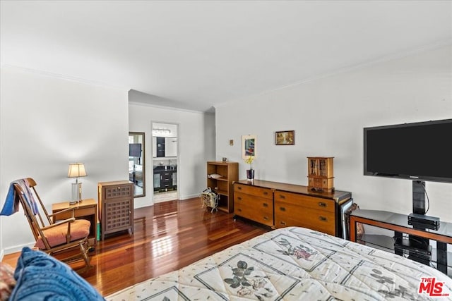 bedroom featuring dark hardwood / wood-style flooring