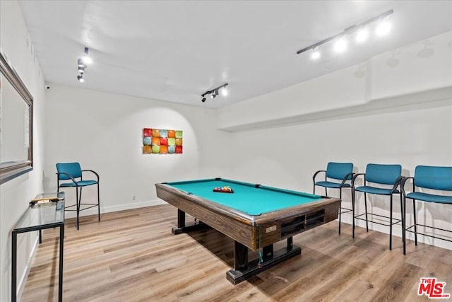 rec room with hardwood / wood-style flooring, rail lighting, and billiards