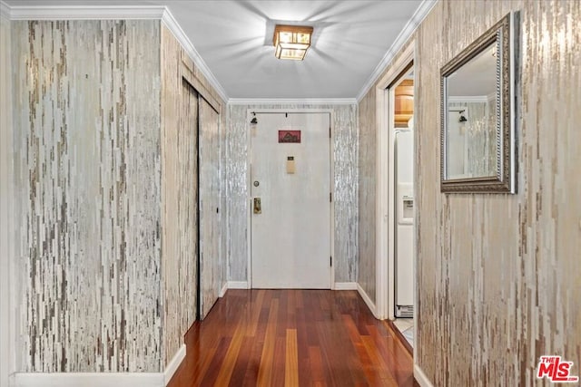 corridor with dark hardwood / wood-style flooring and crown molding