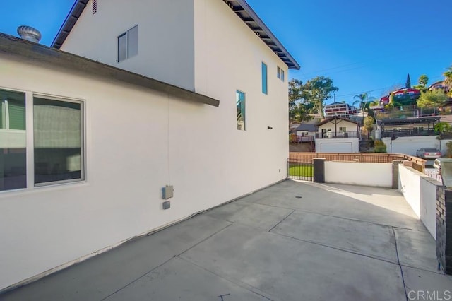 view of home's exterior featuring a patio area