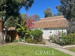 exterior space with a front lawn