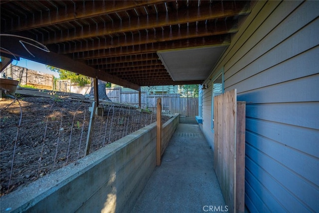 view of patio with an outbuilding