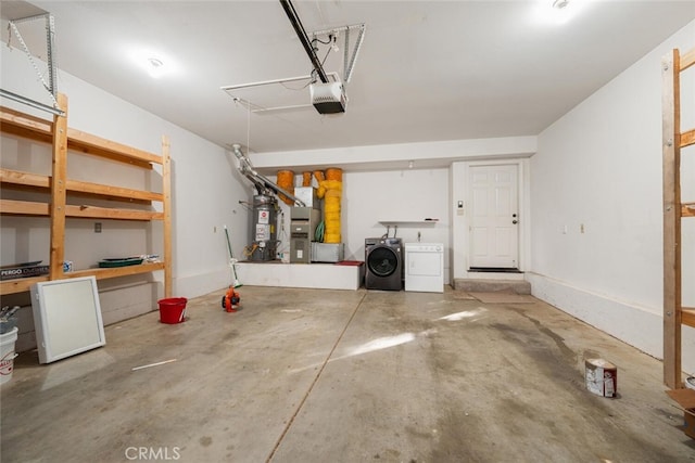 garage featuring a garage door opener, water heater, and washer and clothes dryer