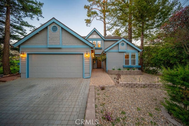 craftsman house with a garage