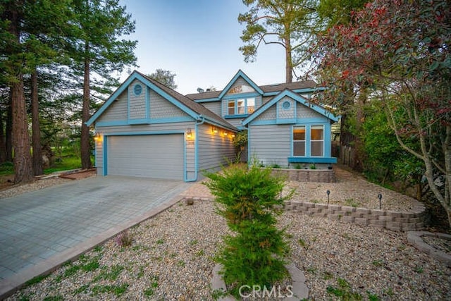 view of front of home with a garage