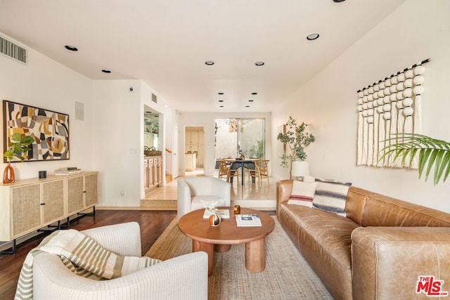 living room with dark wood-type flooring