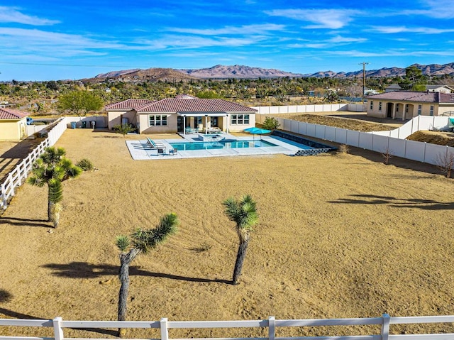 exterior space featuring a mountain view