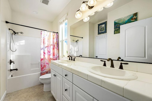 full bathroom featuring toilet, tile patterned flooring, shower / bath combination with curtain, and vanity