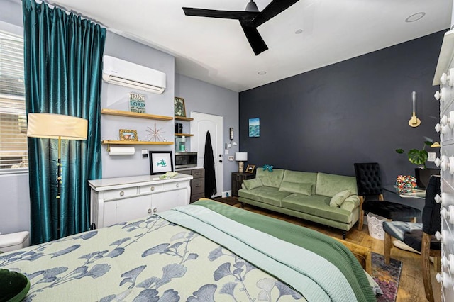 bedroom featuring an AC wall unit, dark hardwood / wood-style flooring, and ceiling fan