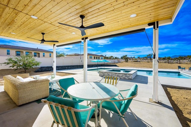 view of patio with a pool with hot tub and ceiling fan