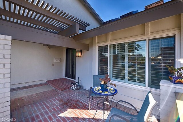 view of patio / terrace featuring a pergola