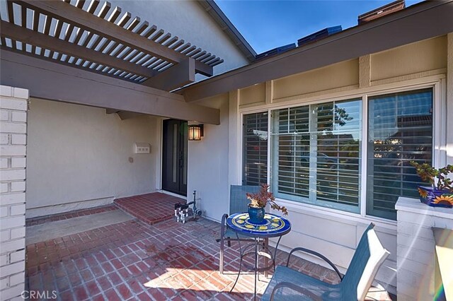 view of patio / terrace featuring a pergola