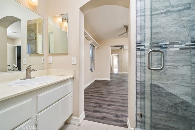 bathroom featuring vanity and walk in shower