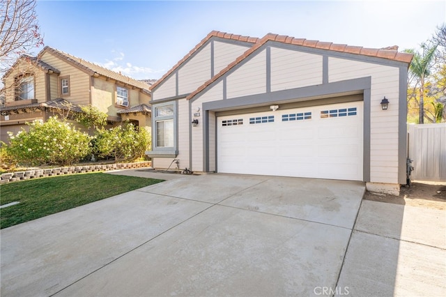 view of front of property with a garage