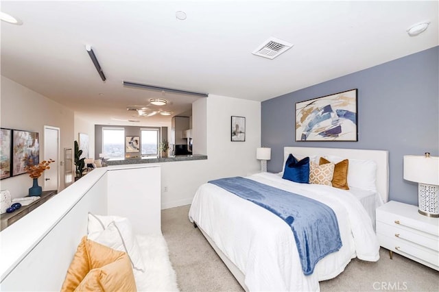 3810 Wilshire Blvd Unit 2010, Los Angeles, CA 90010 - bedroom with light carpet and baseboards