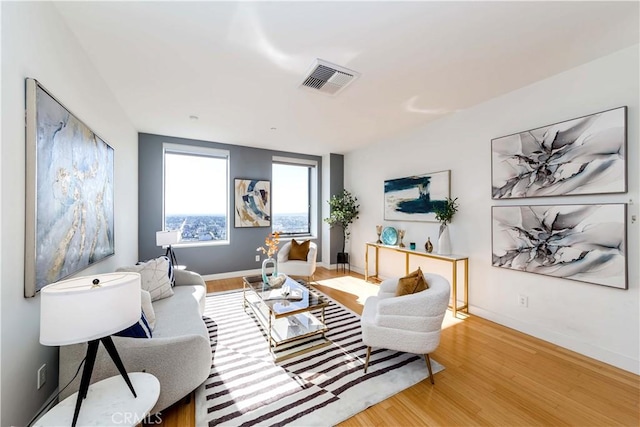 living room with light hardwood / wood-style floors