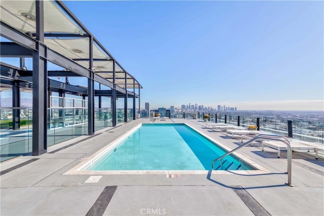 3810 Wilshire Blvd Unit 2010, Los Angeles, CA 90010 - community pool featuring a skyline view and a patio