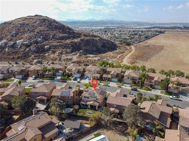 drone / aerial view featuring a mountain view