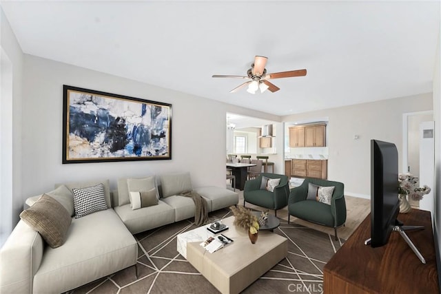 living room featuring ceiling fan