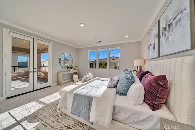 carpeted bedroom featuring french doors, crown molding, and access to outside