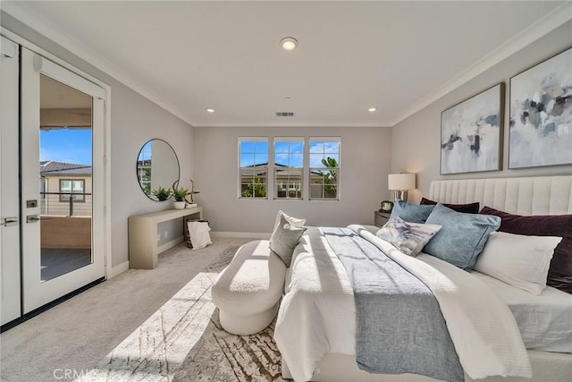 bedroom featuring ornamental molding and light carpet