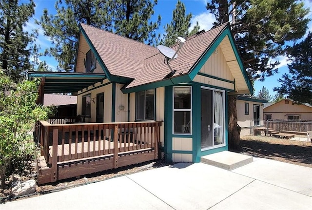 back of house with a patio