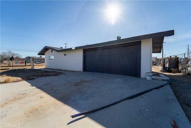 exterior space with a garage