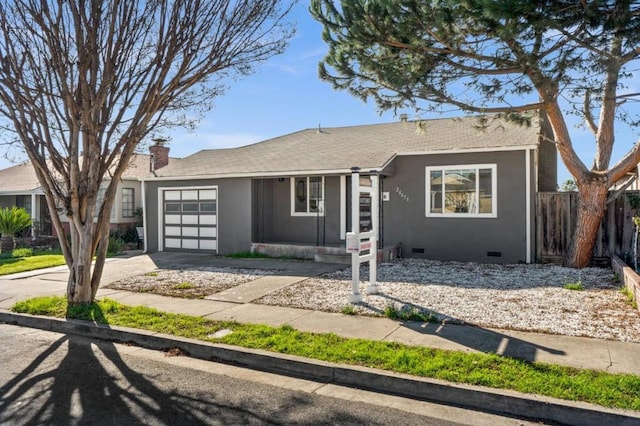 ranch-style home with a garage