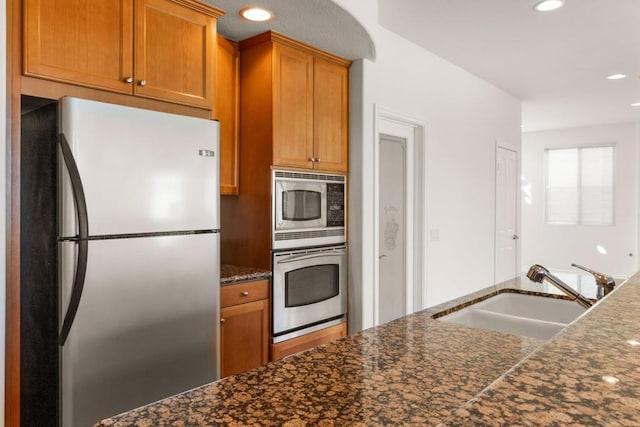 kitchen featuring appliances with stainless steel finishes and sink