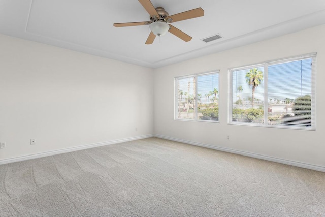 carpeted empty room with ceiling fan