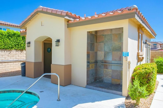 back of property with a patio area