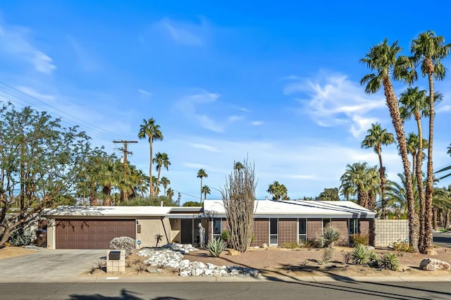 view of front of home featuring a garage