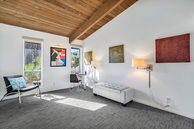 unfurnished room with wood ceiling, carpet floors, and lofted ceiling with beams