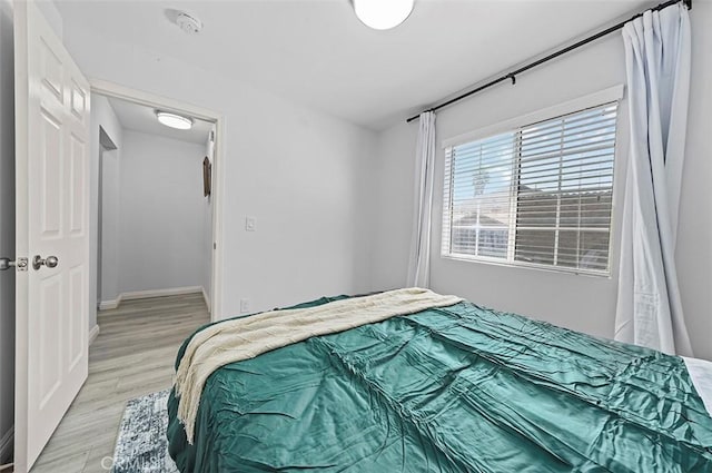 bedroom featuring light hardwood / wood-style floors