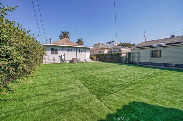 view of yard featuring central AC unit