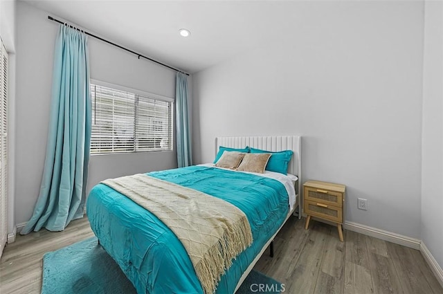 bedroom featuring hardwood / wood-style flooring