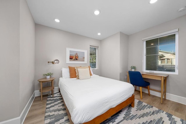 bedroom featuring light hardwood / wood-style floors