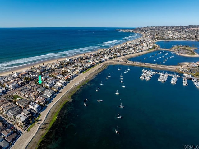 bird's eye view with a view of the beach and a water view