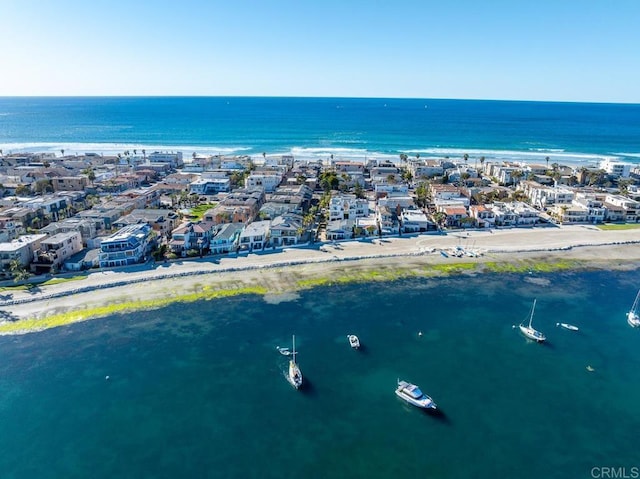 aerial view with a view of the beach and a water view