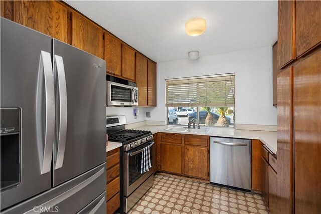 kitchen featuring sink and appliances with stainless steel finishes