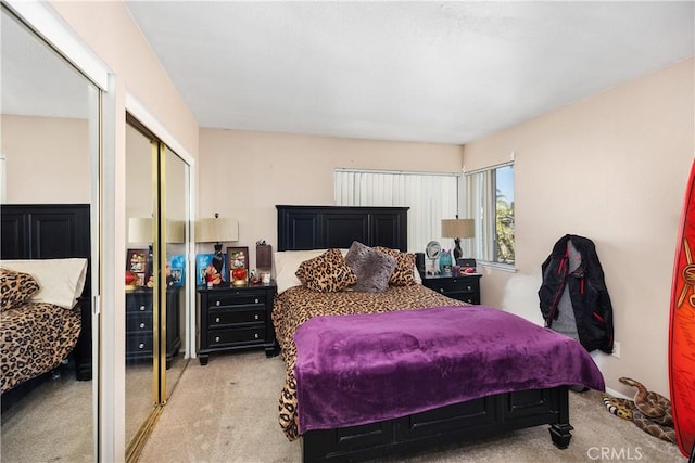 carpeted bedroom with a closet